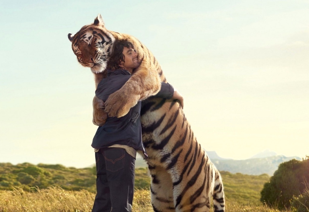 man-hugging-tiger_zpssvghbnew.jpg